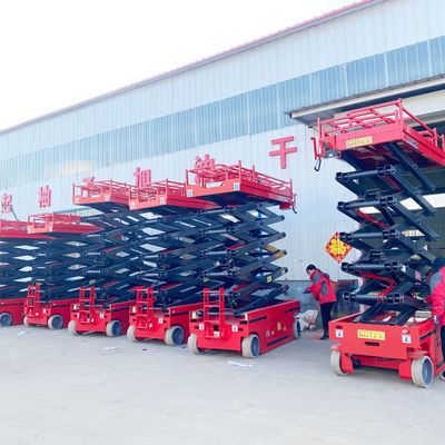 전기 시저 리프터 로더 무게 약 2000kg 및 전문 승강 필요